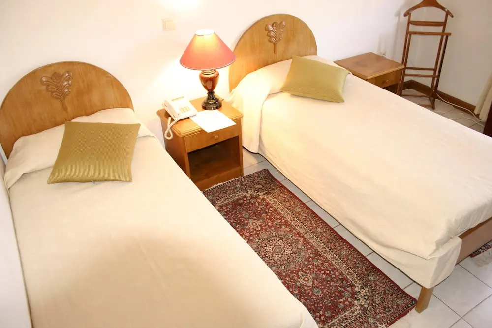 Sunshine Hotel - Chambres
