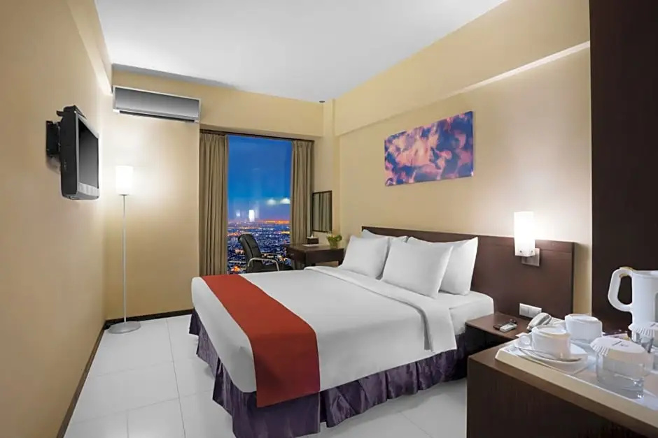 Garuda Plaza Hotel - Chambres