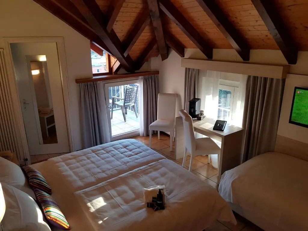 @ Home Hotel Locarno - Chambres