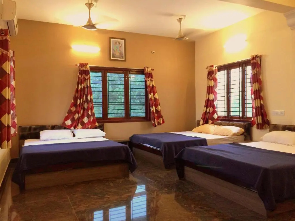 Hotel Sri Hayagriva - Chambres