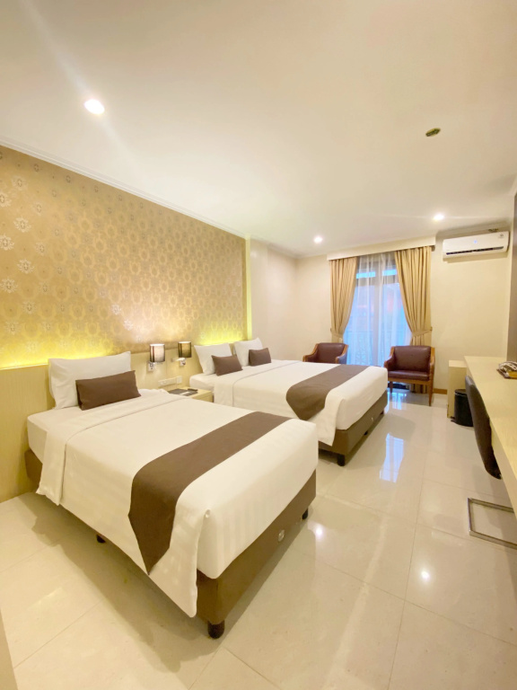 The Amrani Syariah Hotel - Chambres