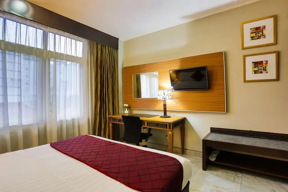 Johns Pardede International Hotel - Chambres