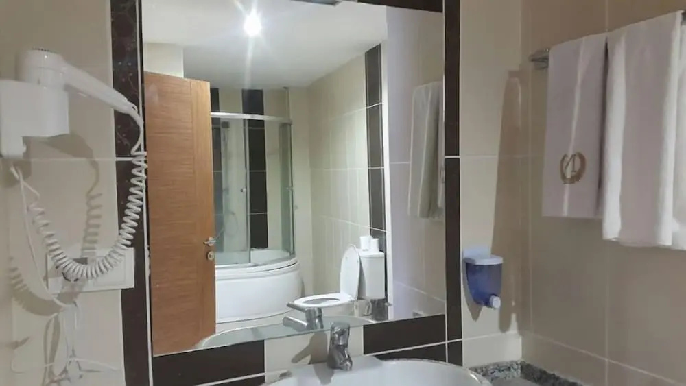 Nevan Suite Hotel - Chambres