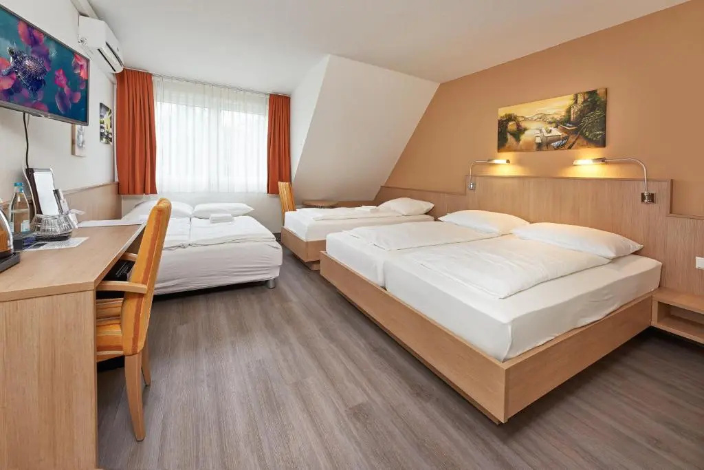 Hotel Touristik - Chambres
