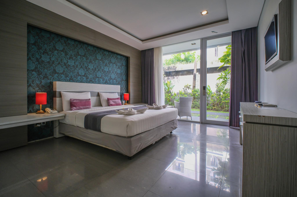 Kamini Legian Hotel — фото