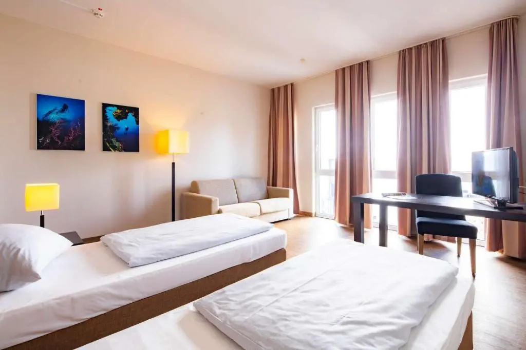 Friendly City Hotel Oktopus - Chambres