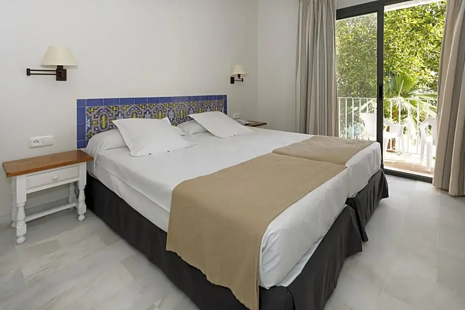 Playa De La Luz Hotel - Chambres