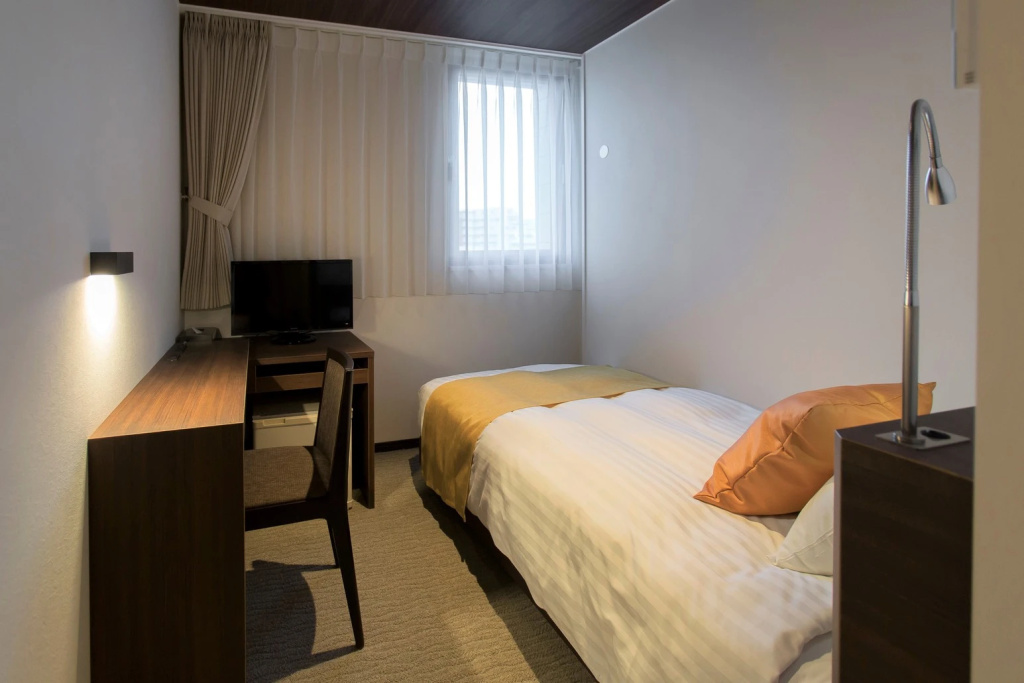 Kita Hotel - Chambres