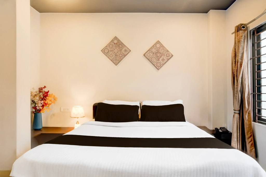 OYO Premium Beltola Tiniali - Chambres