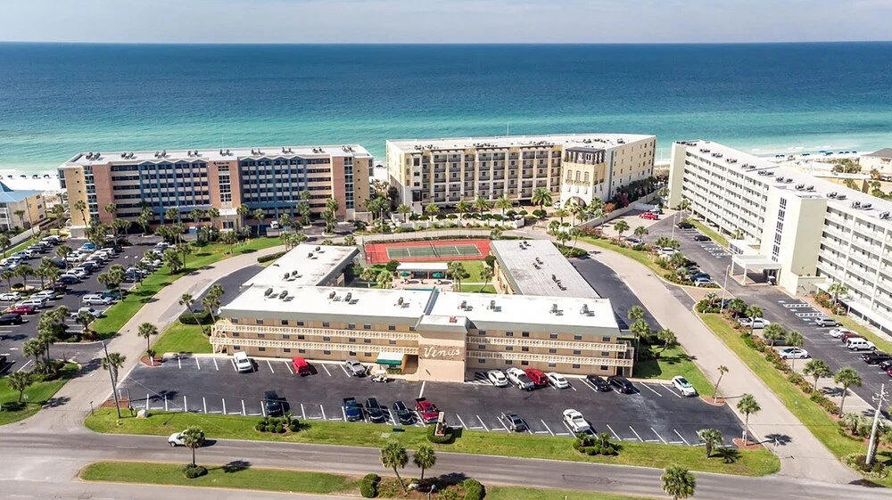 Ground Floor Pool Front Condo Sleeps 8 with easy beach access by RedAwning