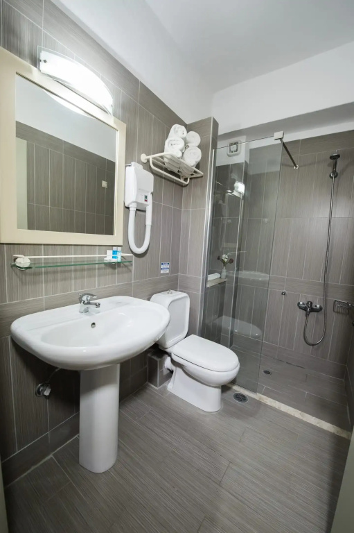 Astron Hotel - Chambres
