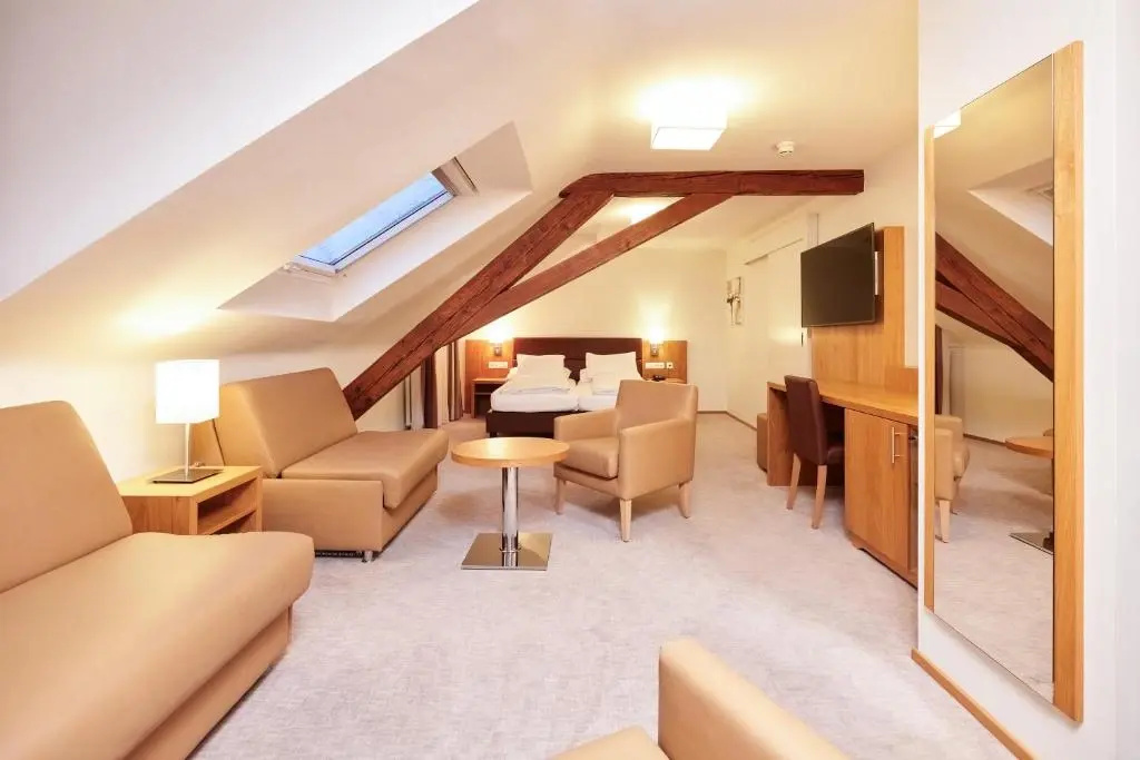 Central City Hotel Rochat - Chambres