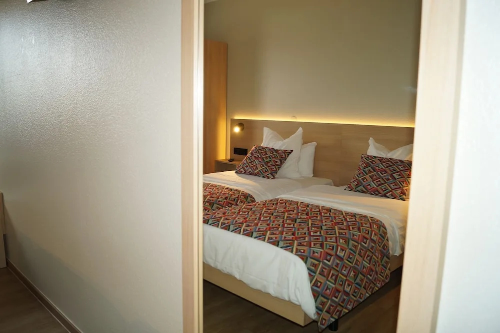Hotel Stand'Inn - Chambres