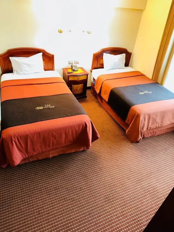 Superior Triple room with city view