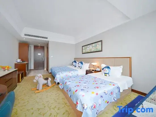 Gloria Plaza Hotel Qingdao - Chambres