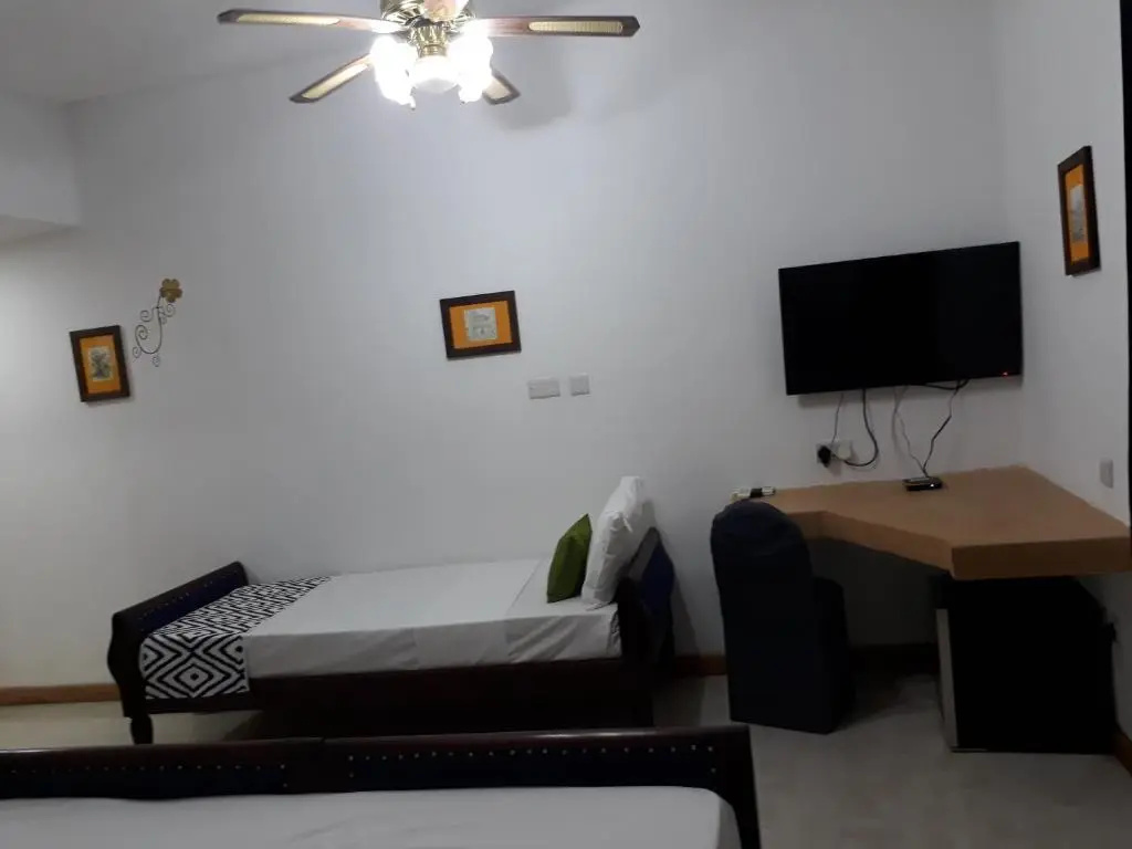 27 Cafe Zanzibar Airport Hotel - Chambres