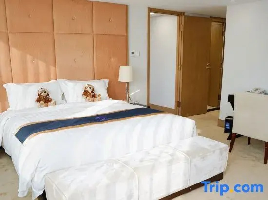 Jingguang Center Apartment Hotel - Chambres
