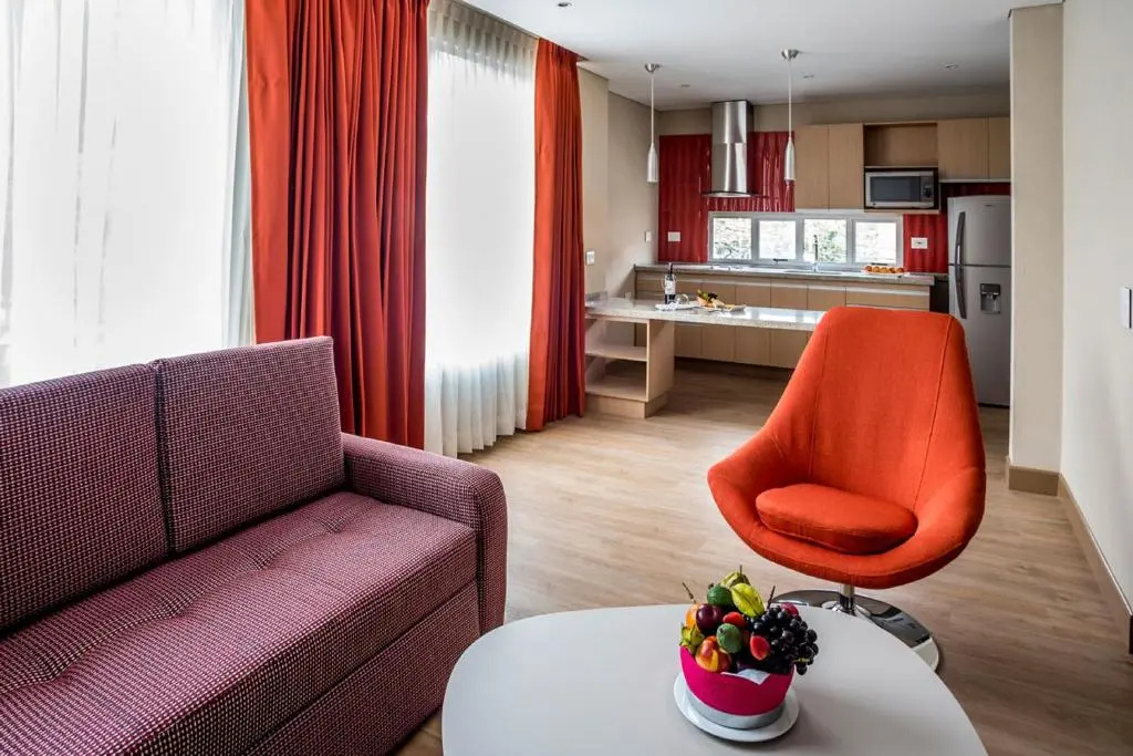 Hotel Plaza Suites - Chambres