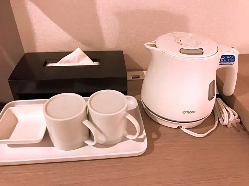 Kita Hotel - Chambres
