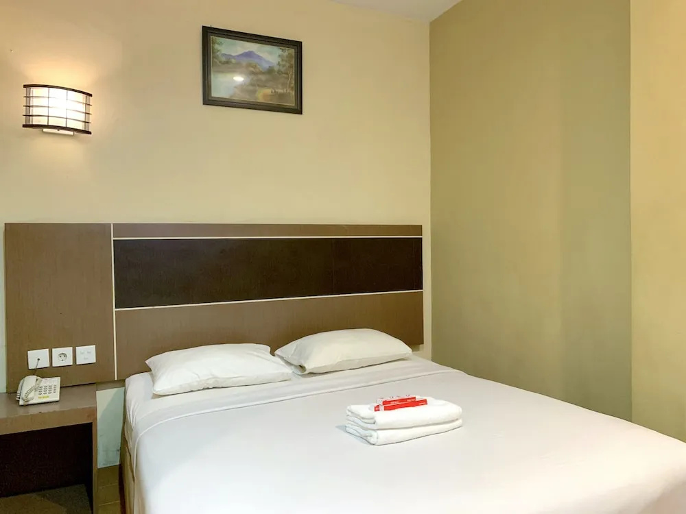 Parma Indah Hotel - Chambres