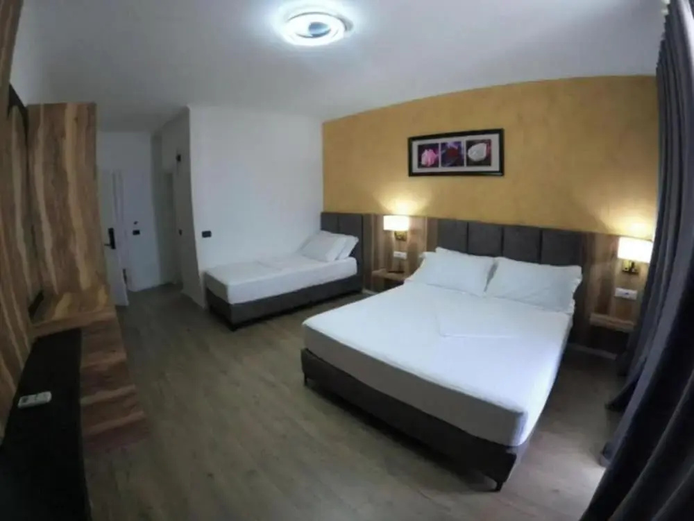 Standard Triple room with sea view