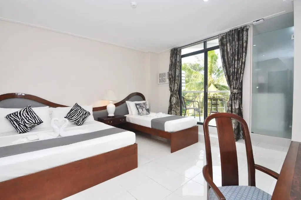 717 Cesar Place Hotel - Chambres