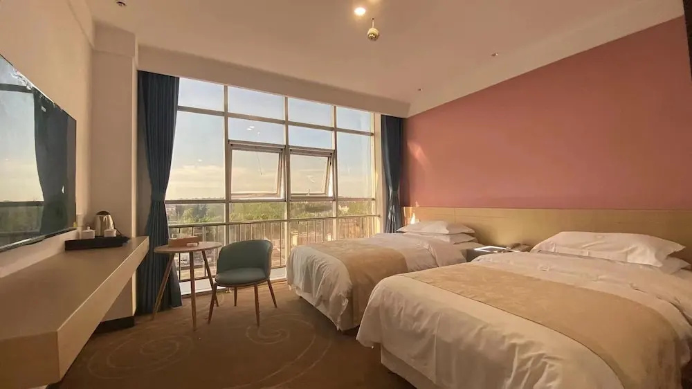 Fusheng Hotel - Chambres