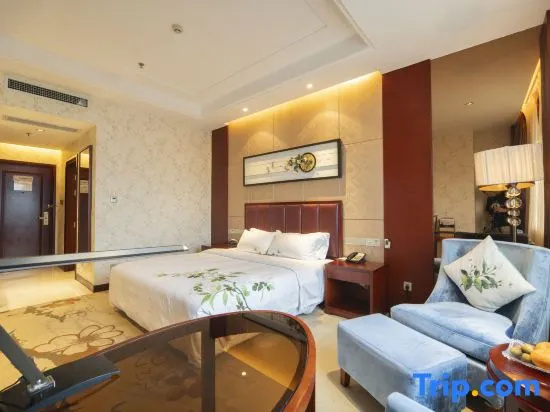 Xinxing Century Hotel - Chambres