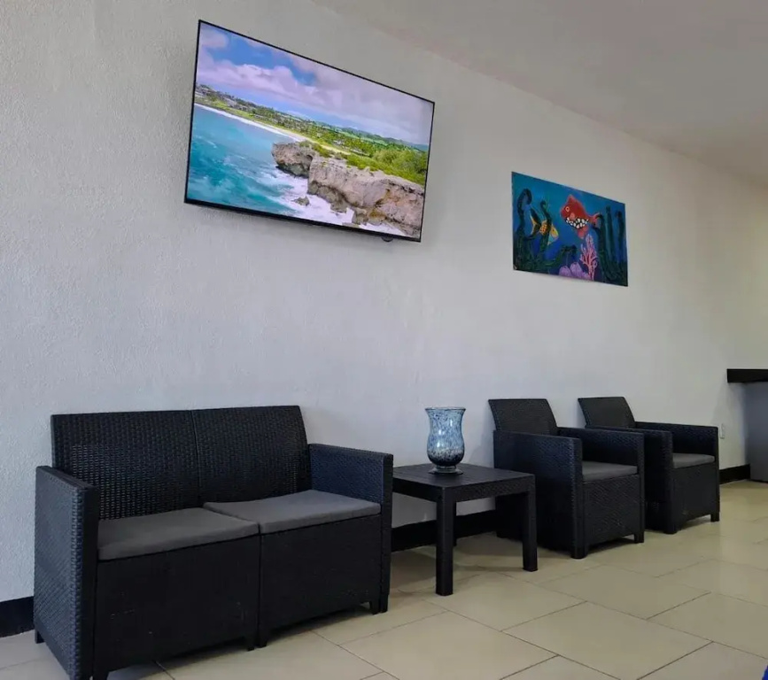 Standard Triple room with partial sea view