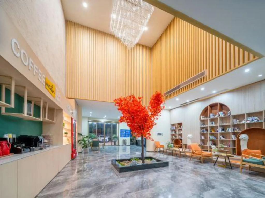 Xinyi Yunqi Hotel (Liaobu Wanrun Plaza)