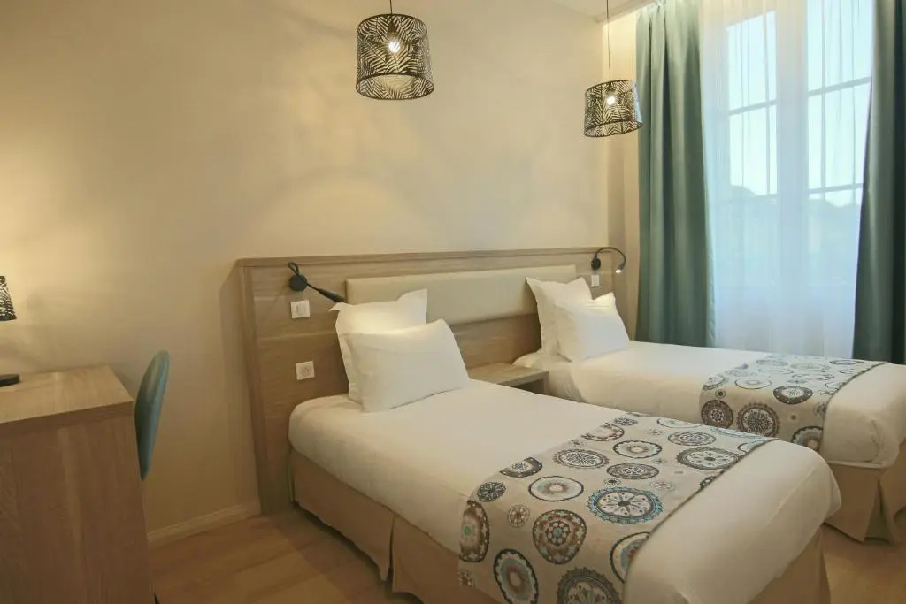 Hotel Montaigne - Chambres