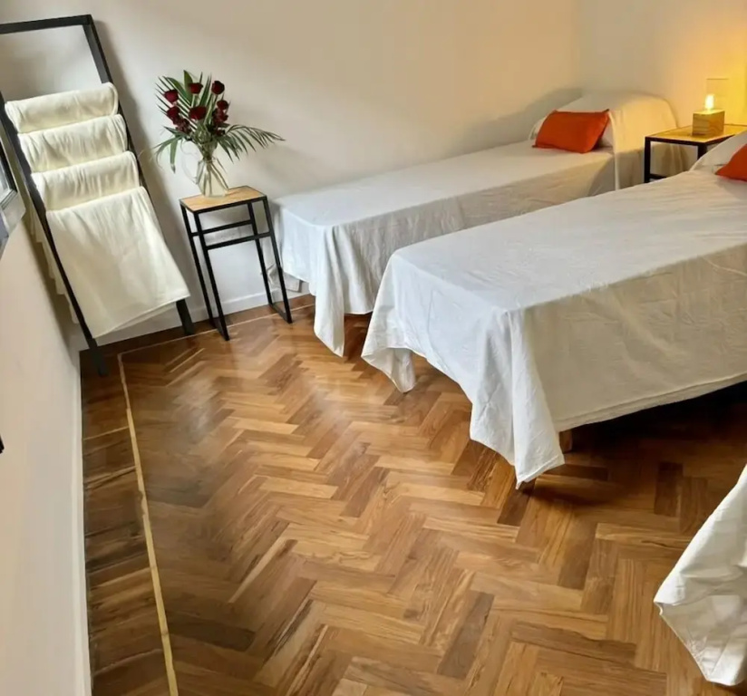 Bed in Dorm with courtyard view