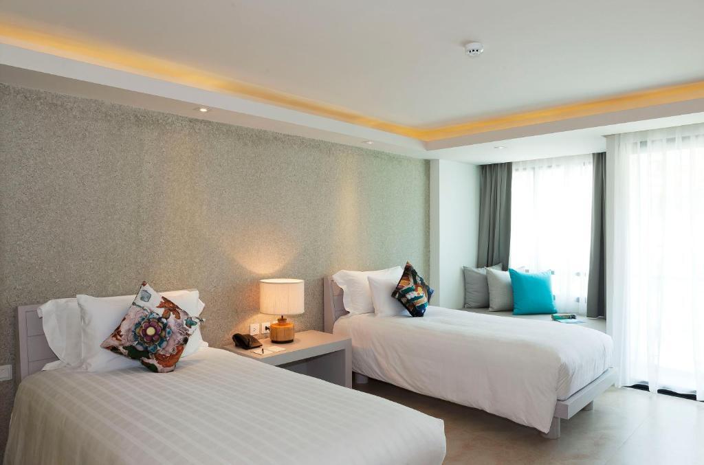 Двухместный номер Superior 2 отдельные кровати в Отель Zenmaya Oceanfront Phuket, Trademark Collection by Wyndham