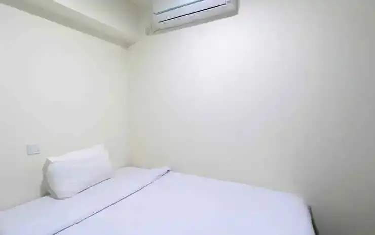 Comfortable and Well Furnished 2BR Meikarta Apartment By Travelio