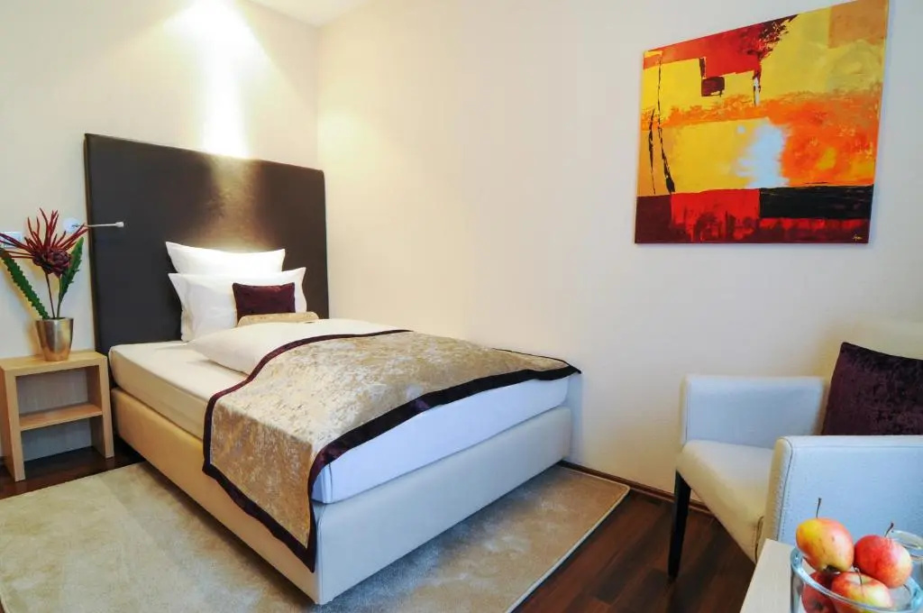 Hotel Merkur - Chambres