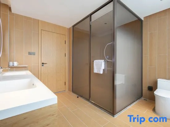 Qingxin Hotel - Chambres