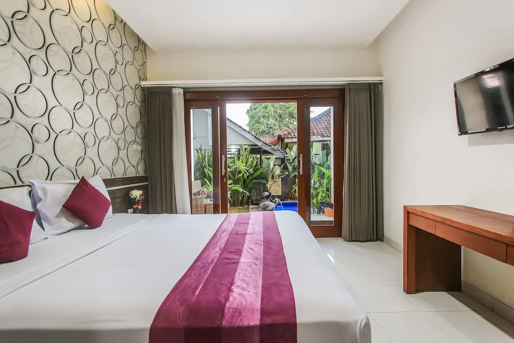 D'gaduh Suite Kuta - Chambres