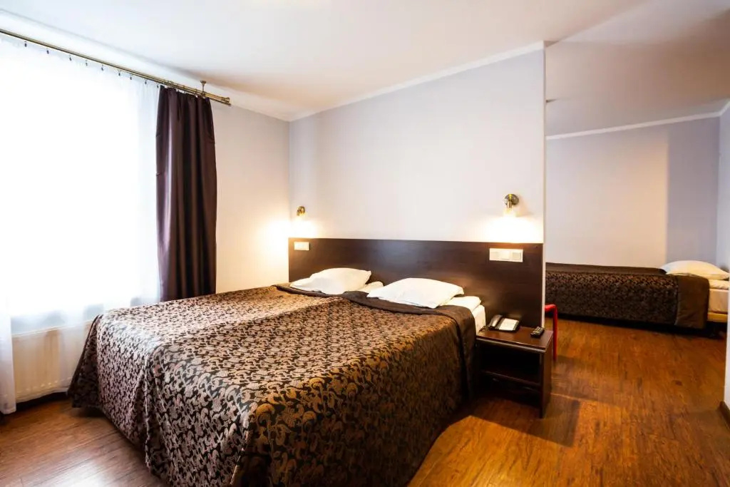 Primo Hotel - Chambres
