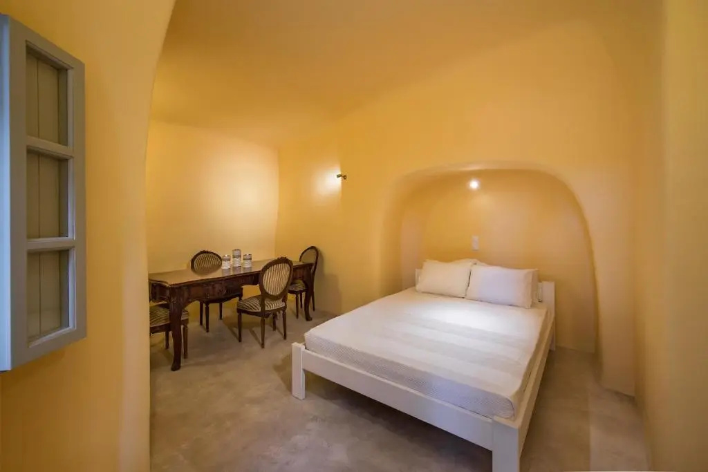 Filotimo Cave Houses - Chambres