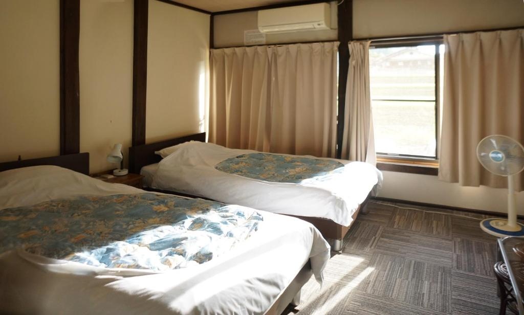 Sakura Guest House - Hostel 사진 12