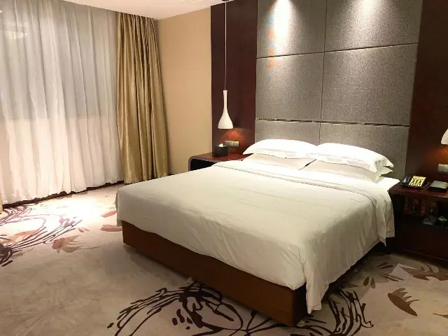 Yinhao Holiday Hotel - Chambres