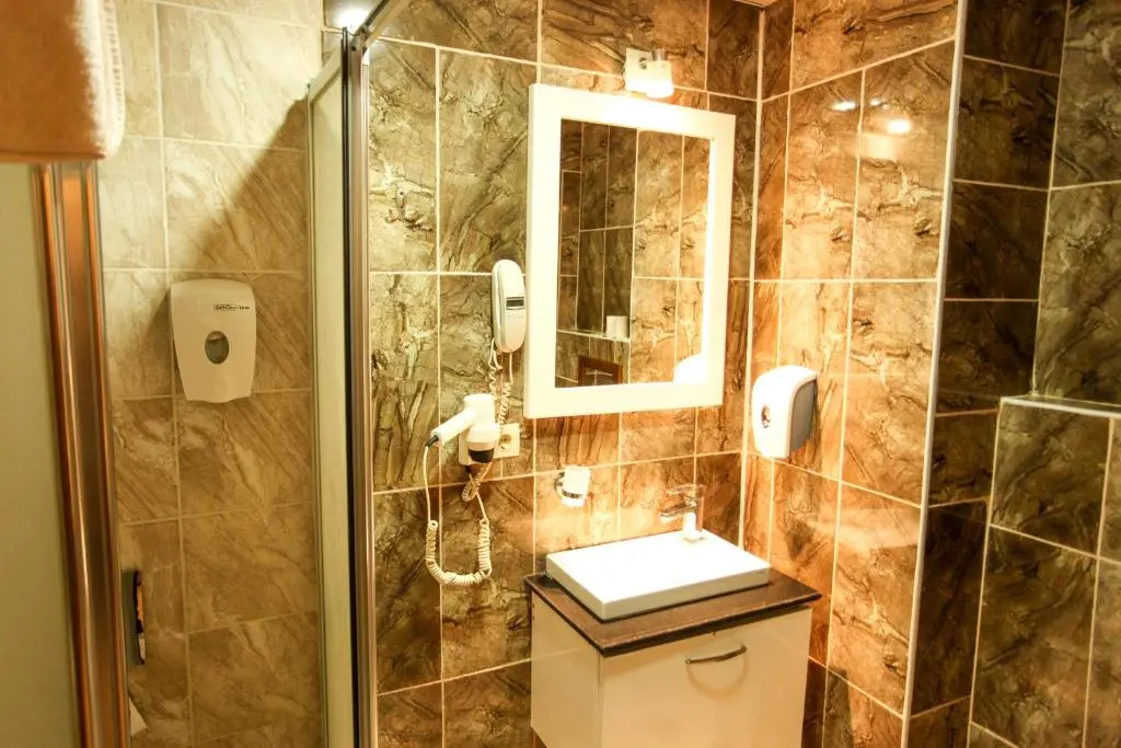 Tughan Hotel - Chambres
