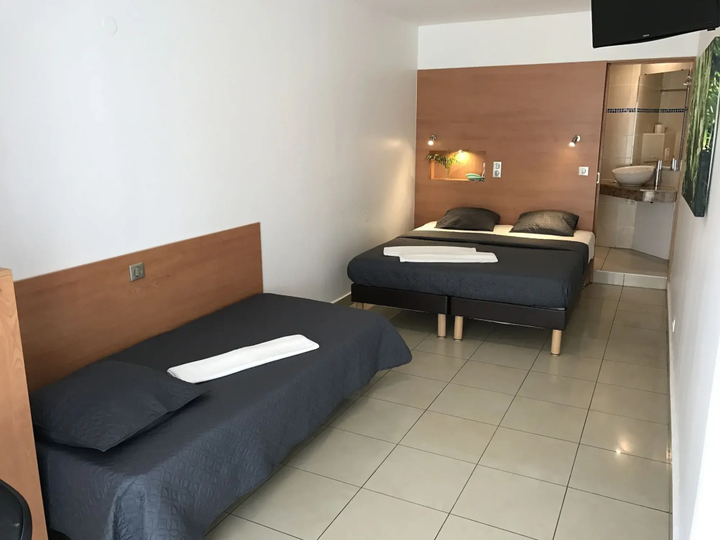 Voir la photo 3 — Karaibes Hotel