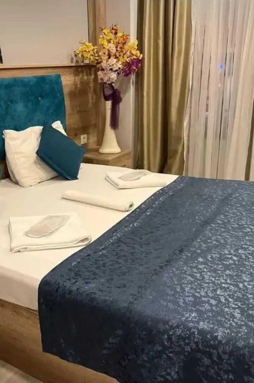 N-Y Suites — 5