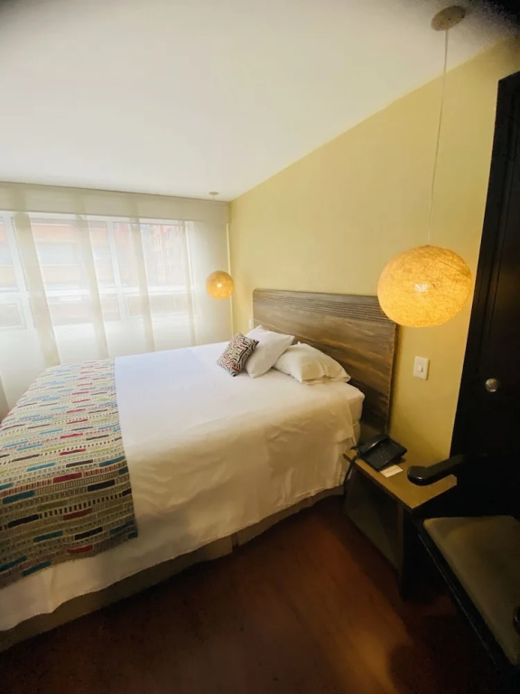 Hotel Retiro 84 - Chambres