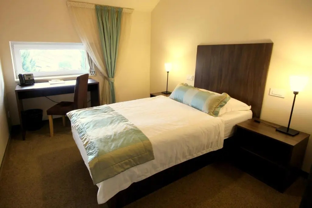 Ambient Hotel - Chambres