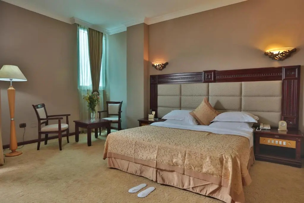 Friendship International Hotel - Chambres