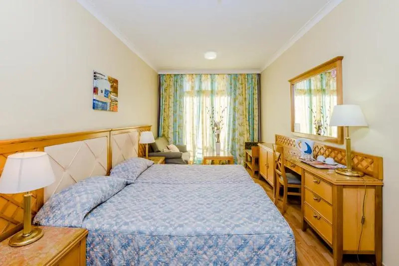 Estella Hotel & Apartments - Chambres