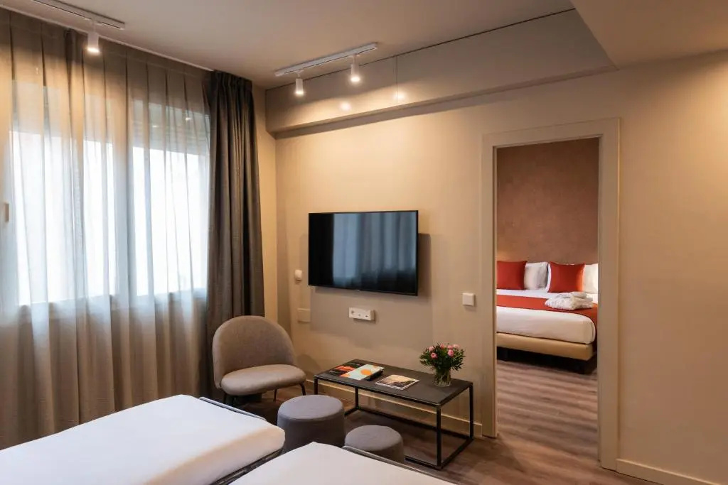 Atenea Rekord Suites Barcelona - Chambres
