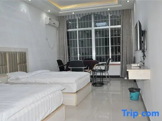 Huayun Hotel - Chambres